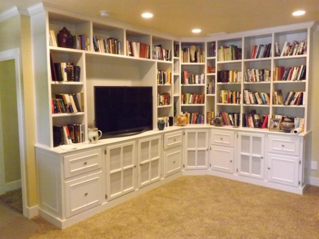18 ft. floor to ceiling entertainment center/bookcase.